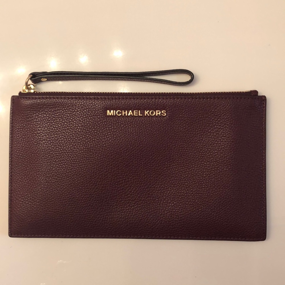 SOLDMichael Kors BRAND NEW large burgundy wristlet